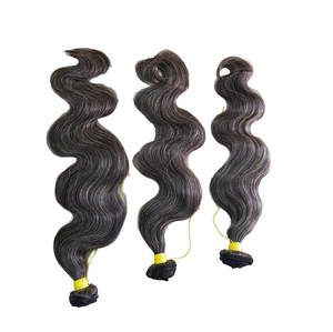 Vente en gros d'extensions de cheveux Remy vierges 100% naturel noir vietnamien brut en vrac corps vague Machine Double trame 100g pour le tressage - Product Image 1