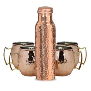 hammered design copper water bottle with copper mug most demanding high quality of copper drinking accessories