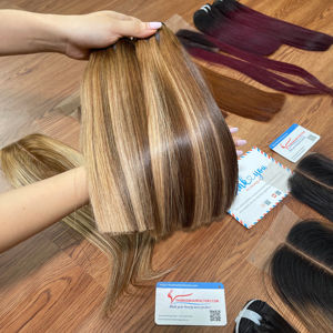 Extensions de cheveux vietnamiens bruts de cheveux humains vietnamiens à trame droite couleur piano super brillante - Product Image 1