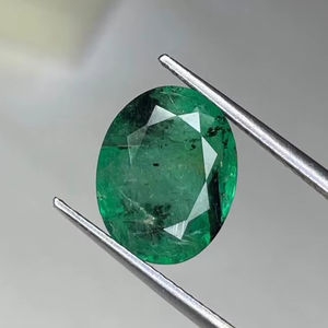 มรกตทรงรีเจียระไนธรรมชาติ สวยงาม  มรกตผสมรูไทล์ - Product Image 1