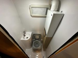 FIRMO Maxi 410 Mini Caravan 4 Person Aluminum Travel Trailer Slide-Out <b>Kitchen</b> Modern <b>Camping</b> RV White Exterior - Product Image 5