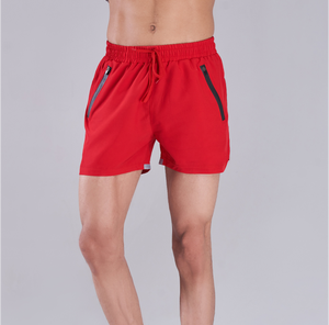 Pantalones cortos de gimnasio para hombre al por mayor, pantalones cortos atléticos con patrón sólido, cintura elástica, pantalones cortos transpirables informales ecológicos con bolsillos para correr - Product Image 1