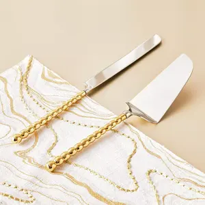 Serveur à gâteau artisanal en acier inoxydable, outil de service de desserts en métal finition or en gros pour les hôtels et les fournitures de restauration - Product Image 1