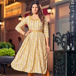 Latest Heavy Rayon FOIL Prints Naira <b>Suit</b> Belt and Neck Embroidered Work Kurtis Collection - Product Image 1