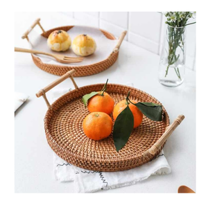 Venta al por mayor de bandejas de ratán de forma redonda con asa, cestas artesanales de almacenamiento para servir comida de restaurante del fabricante de Vietnam - Product Image 2