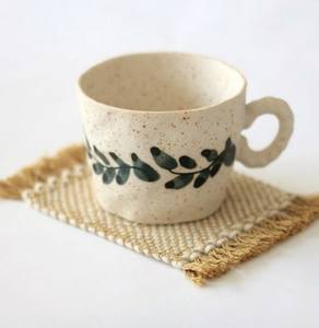 Taza de cerámica única con cuerpo resistente al calor y calidad artesanal perfecta para uso diario o momentos especiales - Product Image 1