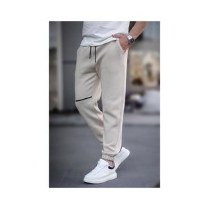Pantalon de survêtement imprimé décontracté pour hommes Pantalon de survêtement tissé respirant de différentes tailles et couleurs pour l'hiver de Turkiye - Product Image 1