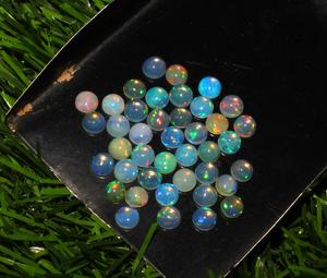 41 Piece 5mm Round Ethiopian Opal Natural Loose Gemstones Lot for Sale - Product Image 1