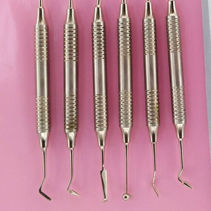 Kit restaurador recubierto de esmalte de relleno compuesto instrumento dental de titanio 6 uds Kit de cirugía odontología quirúrgica - Product Image 2