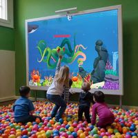 Système de projection de jeu de lancer de boule de mur intérieur interactif Équipement publicitaire d'amusement pour enfants pour centres