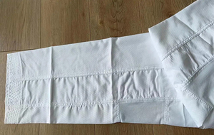 Uniforme de Taekwondo de la Mejor Calidad, Servicio OEM Profesional, Ropa Deportiva Hecha en Pakistán con Logotipo en la Parte Delantera - Product Image 4