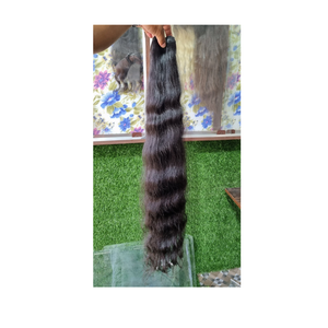 Extensions indiennes de cheveux humains ondulés Remy à un tirage pour un look élégant Cheveux ondulés de haute qualité - Product Image 1