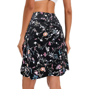 Jupe de tennis athlétique pour femme Short et poches Jupe de golf longueur genou pour entraînement sportif Course à pied et vêtements de sport de tous les jours - Product Image 3