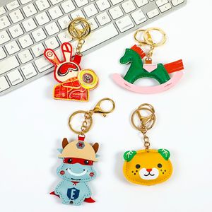 Cuir PU créatif exquis et mignon lettre porte-clés cerise fruits sac breloque avec bouton pour les femmes belle porte-clés personnalisé - Product Image 4