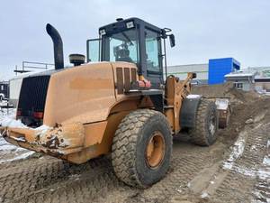 Cargador de ruedas Case 721D 2006: Cargador de tamaño medio fiable para la construcción y el manejo de materiales - Product Image 6