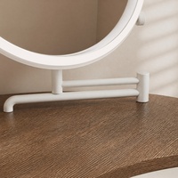 Ensemble de coiffeuse minimaliste de luxe gain de place, table de maquillage blanc crème avec armoire de rangement dissimulée pour petit appartement ou chambre.