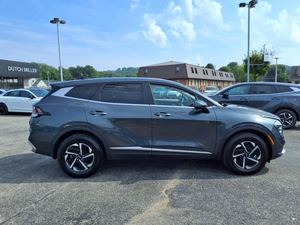 สีเทาสะอาด2025 Kia Sportage HYBRID LX AWD ใช้กับเบาะผ้าแพคเกจพรีเมี่ยมระบบนำทางบลูทูธซันรูฟ - Product Image 2