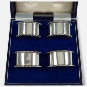 Ronds de serviette uniques en acier inoxydable aux formes minimalistes et sophistiquées et parfaits pour les tables de la maison moderne - Product Image 1