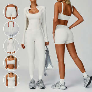 Ensemble de sport cinq pièces uni pour femme : haut court à manches longues, soutien-gorge de sport et short taille mi-haute pour le yoga et le fitness - Product Image 1