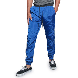 2025 coupe-vent pantalon nouveau Design solide imperméable séchage rapide coupe-vent hommes pantalons d'extérieur pour hommes coupe-vent pantalon - Product Image 1