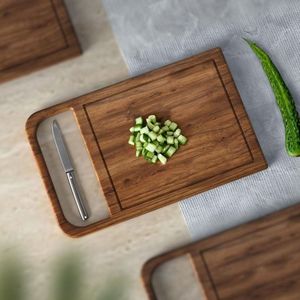 Wooden chopping board with juice groove to prevent <b>liquid</b> spills while cutting fresh fruits or cooked meat - Product Image 1