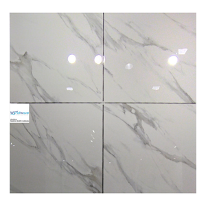 Carrelage en porcelaine brillant aspect marbre de Carrare 600x600mm Carrelage en porcelaine brillant durable de Carrare pour sols et murs résidentiels et commerciaux - Product Image 1