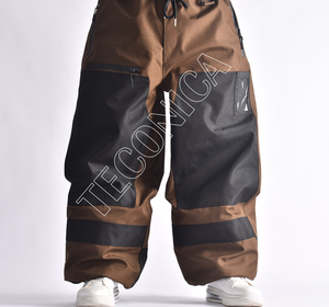 Pantalones de nieve impermeables marrones y negros con diseño de dos tonos Forro cálido de lana Cintura elástica y dobladillo ceñido para mayor comodidad - Product Image 1