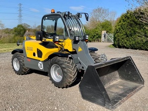 Mini-chargeuse télescopique diesel Wacker Neuson TH412 4x4 avec une grande capacité de levage pour la manutention et le levage de matériaux - Product Image 1