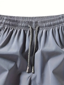 Pantalones cortos de gimnasio para hombre baratos al por mayor, pantalones cortos de entrenamiento físico de malla de playa de secado rápido con bolsillos de talla grande, cintura estampada de poliéster liso - Product Image 2