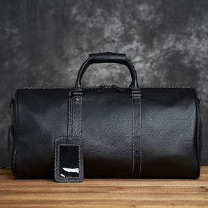 กระเป๋าทรงดัฟเฟิลหนังกันน้ำใช้ได้ทั้งชายและหญิงกระเป๋าแฟชั่นแบบปิดซิปสำหรับใส่ไปเที่ยวยิมข้ามคืนโลโก้ตามสั่งความจุขนาดใหญ่ - Product Image 3