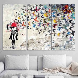 Tableau imprimé sur toile : Banksy Butterfly Girl - Décoration murale élégante, lot de 3 toiles - Product Image 1