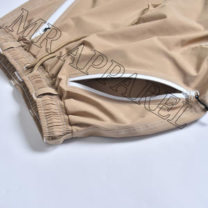 Venta al por mayor de pantalones de esquí de estilo holgado para la nieve para los hombres y las mujeres pantalones de esquí con aislamiento Unisex tela impermeable Cargo pantalones de nieve - Product Image 4