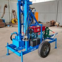 Machine de forage de puits d'eau portable à roues, tractable, à moteur diesel, hydraulique, rotative, avec circulation de boue - Vente chaude