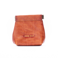 Porte-monnaie fourre-tout vintage fait à la main porte-monnaie en cuir gaufré petit dieu du soleil avec fermeture à presser pour un usage quotidien