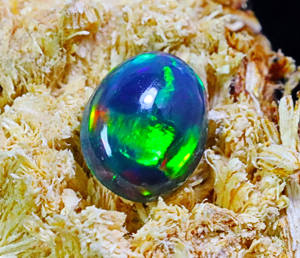 พลอยโอปอลแท้สีดำของชาวเอธิโอเปียอัญมณีโอปอลไฟกาแลคซีพลอยขัดเงาเรียบรูปไข่ทรงรีเอธิโอเปียนโอปอลทรงหลังเบี้ยสีดำ - Product Image 2