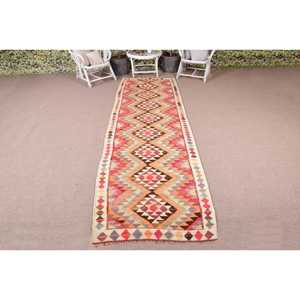 Tapis turc Kilim vintage 3,2 x 11,5 pieds, écologique, en laine patchwork orange avec envers en latex - Product Image 1