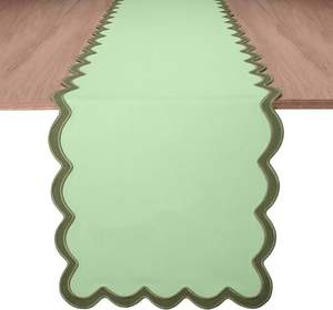 Caminos de mesa de lino sutil con bordado monocromático, perfectos para decorar mesas de comedor con estilo discreto en el hogar. - Product Image 1