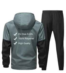 Survêtements de sport unisexes en nylon vierge OEM pour hommes, ensemble veste et pantalon de survêtement unisexe de haute qualité avec fermeture éclair réglable aux jambes - Product Image 2