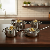Ensemble de casseroles et poêles élégant en acier inoxydable avec finition martelée argentée, couvercles décoratifs dorés en forme de citrouille, batterie de cuisine écologique