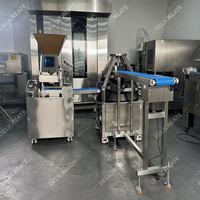 Machine à diviser et à arrondir la pâte en continu