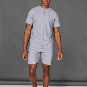 Conjunto Deportivo para Hombre, Ropa de Gimnasio de Secado Rápido y Transpirable, Camiseta de Manga Corta de Verano, Pantalones Cortos de Entrenamiento para Correr, Baloncesto, Color Sólido - Product Image 2