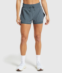 Short bleu 2 en 1 pour femmes qui évacue la sueur Short de course léger pour femmes Short de course réglable pour femmes Entrejambe 4" - Product Image 2