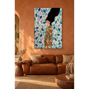 Fida Woman in Gold Patterned Dress on Blue Leaf Background <b>Canvas</b> Print - Product Image 2