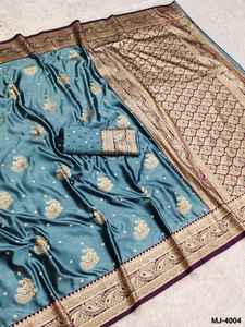 ชุดส่าหรีผ้าซาตินสวยงามสำหรับผู้หญิงรุ่นล่าสุด พร้อมเสื้อผ้าที่ทำจากผ้าเนื้อเรียบ ตกแต่งด้วยงานปักขอบด้วยด้ายซารี เหมาะสำหรับงานแต่งงาน - Product Image 6