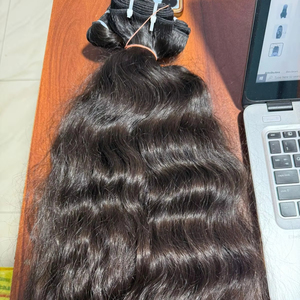 Vente en gros de cheveux indiens vierges bruts de haute qualité Extensions de cheveux ondulés naturels droits non traités, doux et durables. - Product Image 3