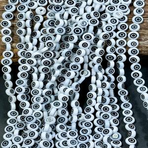 Venta al por mayor a granel hermoso blanco negro mal de ojo plano moneda forma CRISTAL MURANO y cuentas de vidrio para la fabricación de joyas y manualidades - Product Image 4