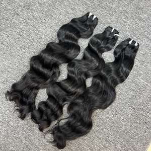 Extensiones de cabello humano al por mayor de ondas naturales de alta calidad en tipo de cabello vietnamita de trama - Product Image 1