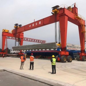 رافعة جسرية مطاطية الإطارات بحمولة 40 طن، 6 طبقات، كابينة عالية متعددة الطوابق تعمل بالمحرك مع تحكم عن بعد، ارتفاع رفع 20 متر لحاويات الموانئ - Product Image 3