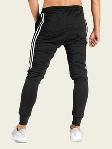 Vente en gros pour hommes, jogging de sport coupe ajustée personnalisé, pantalon de survêtement en molleton de coton avec bandes latérales, style uni vierge - Product Image 3