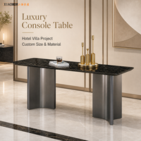 Table console rectangulaire moderne de luxe avec plateau en marbre noir rotatif, base en métal brossé, 8 places, pour entrée d'hôtel, salle à manger